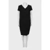 Fitted black dress with tag