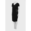 Fitted black dress with tag