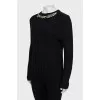 Wool jumper decorated with rhinestones