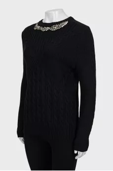 Wool jumper decorated with rhinestones