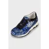 Sneakers embroidered with sequins