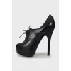 Open toe ankle boots with perforations