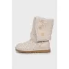 Beige knitted boots