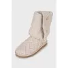 Beige knitted boots