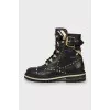 Leather boots with metallic decor