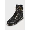Leather boots with metallic decor