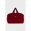 Boston bag with tag