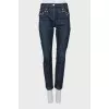 Dark blue jeans with metallic detailing