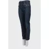 Dark blue jeans with metallic detailing