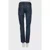 Dark blue jeans with metallic detailing