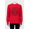 Red sweatshirt with embroidered logo
