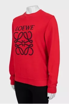 Red sweatshirt with embroidered logo