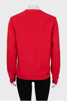 Red sweatshirt with embroidered logo