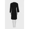 Woolen dress decorated with toggles