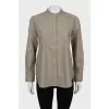Green collarless shirt