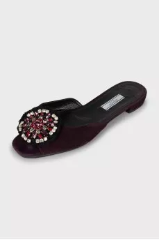 Suede slippers decorated with rhinestones