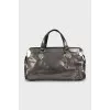 Silver bag with metal logo