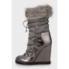 Insulated boots with high wedges