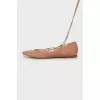 Suede ballerinas with ties