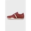 Leather burgundy sneakers with perforations