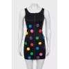 Mini dress decorated with buttons