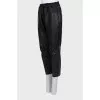 Leather trousers with textile upper