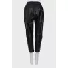 Leather trousers with textile upper