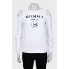 White sweatshirt with brand logo