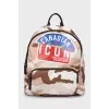 Backpack in military print with tag