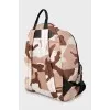 Backpack in military print with tag