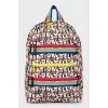 Backpack in a bright print with a tag