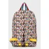 Backpack in a bright print with a tag