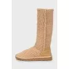 Beige knitted boots