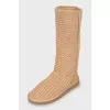 Beige knitted boots