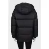 Black down jacket with tag