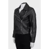 Leather jacket with zippers on the sleeves