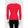 Fitted red ruffle jumper