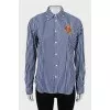 Striped shirt with embroidered logo