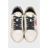 Leather sneakers with print and studs