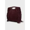 Suede bag with fringed decoration