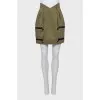 Green mini skirt with tag