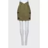 Green mini skirt with tag