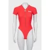 Red bodysuit with zipper and tag