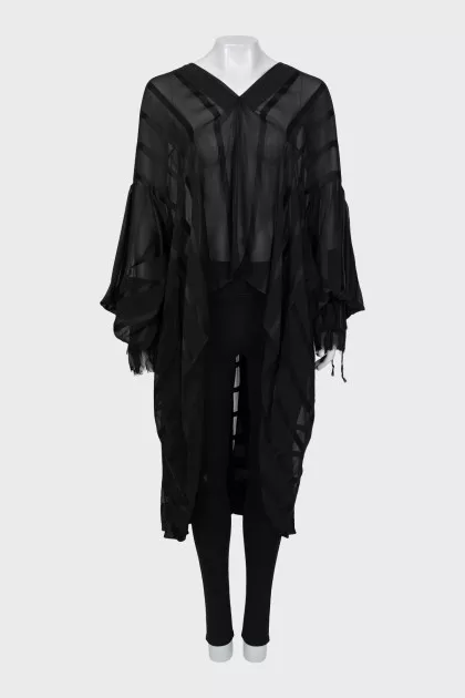 Sheer, loose-fitting blouse