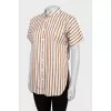 Striped shirt with slits on the sides