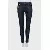 Skinny jeans decorated with chain
