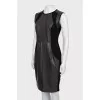 Dress with leather inserts and tag