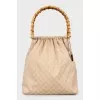 Bucket bag in signature print