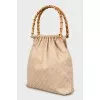 Bucket bag in signature print