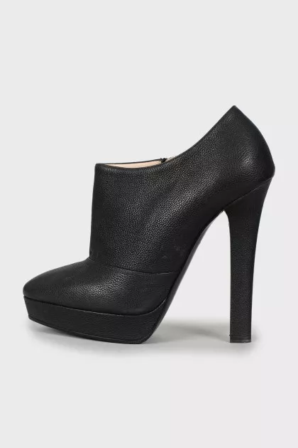 High-heeled leather ankle boots